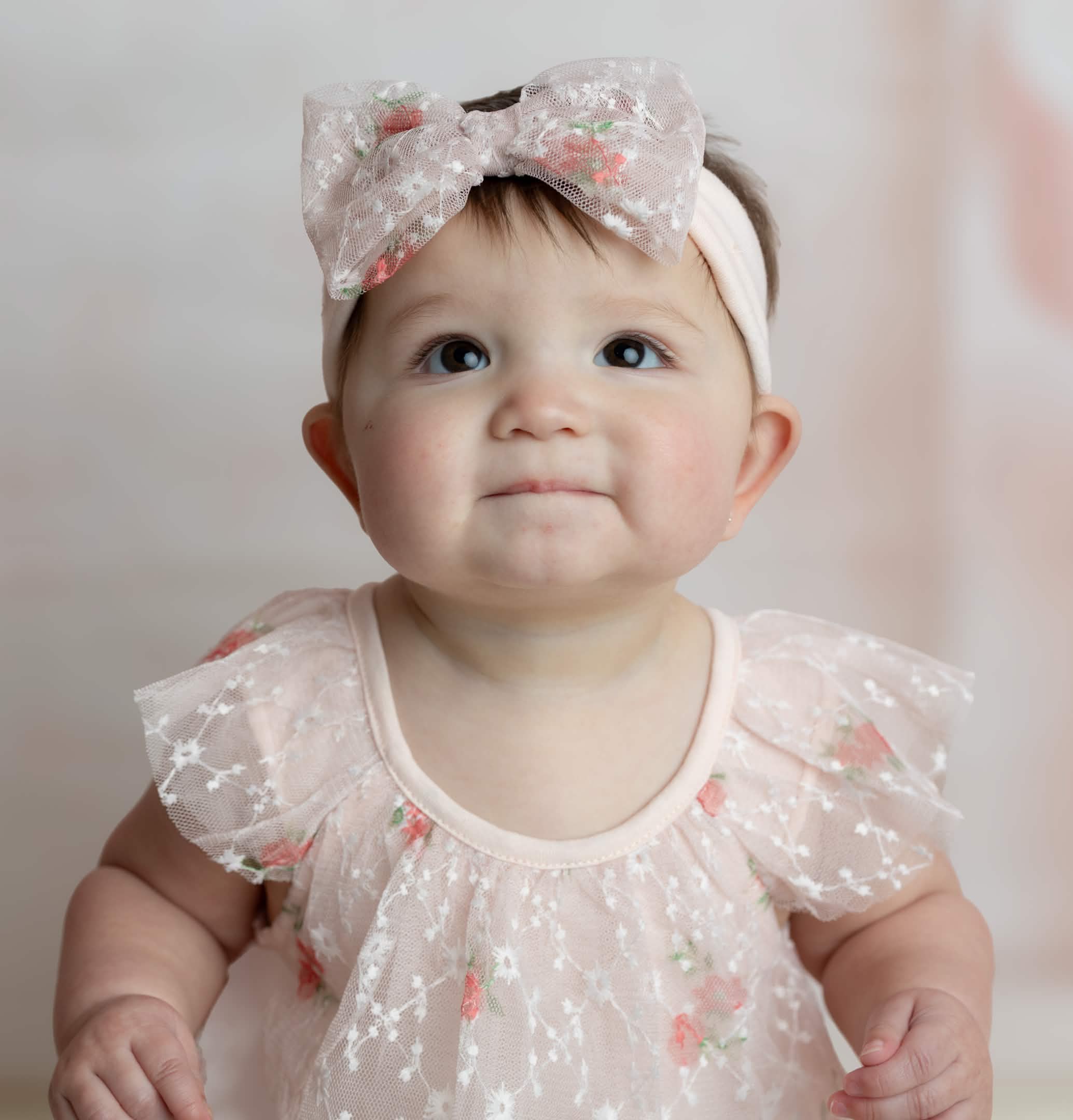 Newborn portrait in lace dress